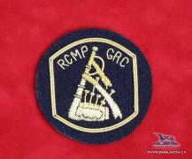  EE-045 - RCMP Piper Appointment Badge - Gold on Blue 