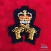  EE-076 - Crossed Pistol with Crown - Gold on Blue 
