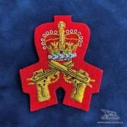  EE-076R - Crossed Pistols with Crown - Gold on Red 