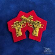  EE-071R - Crossed Pistols - Gold on Red 
